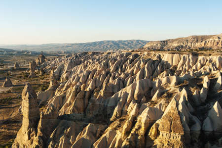 Detailed photo of vivid rock formations shaped by a morning light - seen from above in Cappadocia, Turkeyの写真素材