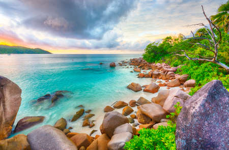 Beautiful sunset over the famous beach Anse Lazio, Praslin island, Seychelles.の写真素材