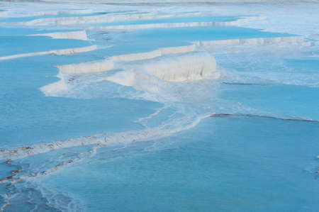 Blue pools and white travertine terraces at Pamukkale, Turkeyのeditorial素材