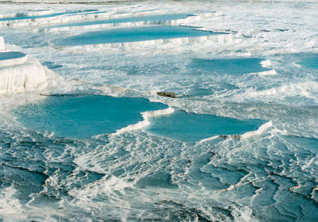 Blue pools and white travertine terraces at Pamukkale, Turkeyのeditorial素材