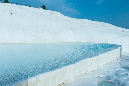 Blue pools and white travertine terraces at Pamukkale, Turkeyのeditorial素材