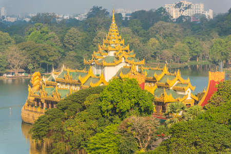 Golden Karaweik palace on Kandawgyi lake looks like an ancient royal barge. Yangon, Myanmarのeditorial素材