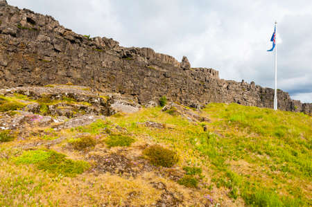 Location of Althing, the oldest parliament on the Earth, is marked by Icelandic flag. Thingvellir national park, Icelandのeditorial素材