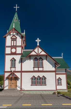 Beautiful small wooden Icelandic church in Husavik, Northern Icelandのeditorial素材