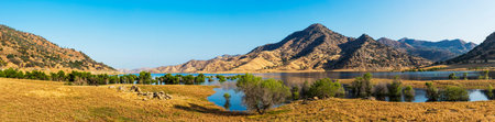 Panoramic photo of Lake Kaweah. The lake is water reservoir on Kaweah river beneath Sierra Nevada mountains, California, USAの写真素材