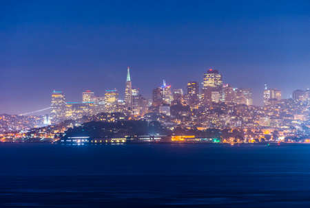 Evening photo of a San Francisco skyline seen from the Golden Gate bridge. California, USAの写真素材