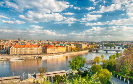 View at bridges across the river Vltava in Prague at duskの写真素材