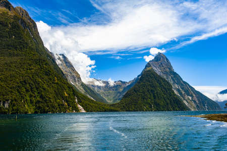 Famous Mitre Peak rising from the Milford Sound fiord. Fiordland national park, New Zealandの写真素材