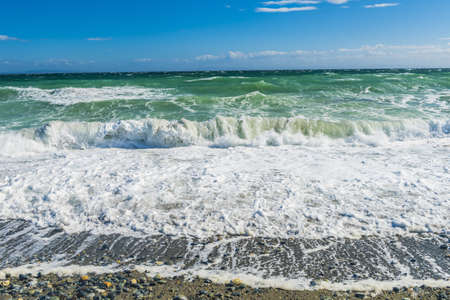 Rough sea with violent waves in South of Argentinian Tierra del Fuegoの写真素材