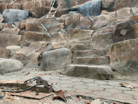Old stone wall made of stone and cement, background photo textureの写真素材