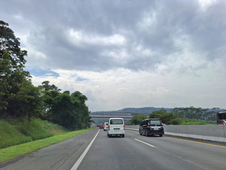 View of the toll road crowds during the Christmas and New Year holidays, Trans Java Toll Road (Jalan Tol Trans Jawa, Semarang - Bawen) in Central Java, Indonesia.の写真素材