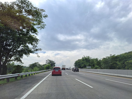 View of the toll road crowds during the Christmas and New Year holidays, (Jalan Tol Trans Jawa, Semarang - Bawen) in Central Java, Indonesia. 26 December 2024の写真素材