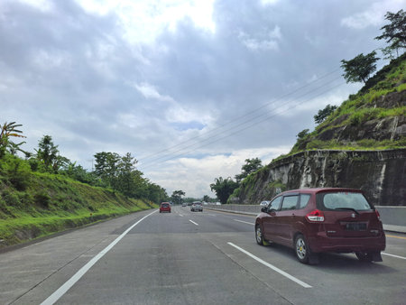 View of the toll road crowds during the Christmas and New Year holidays, (Jalan Tol Trans Jawa, Semarang - Bawen) in Central Java, Indonesia.26 December 2024の写真素材