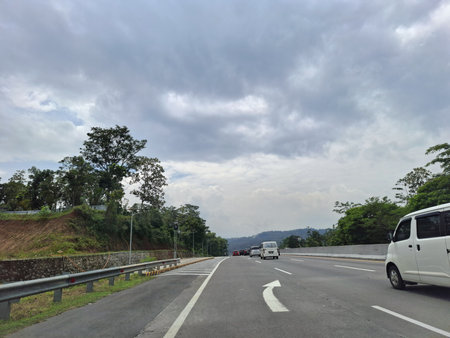 View of the toll road crowds during the Christmas and New Year holidays, Trans Java Toll Road (Jalan Tol Trans Jawa, Semarang - Bawen) in Central Java, Indonesia.の写真素材