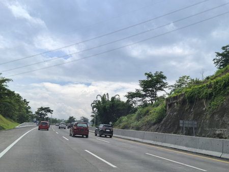 View of the toll road crowds during the Christmas and New Year holidays, Trans Java Toll Road (Jalan Tol Trans Jawa, Semarang - Bawen) in Central Java, Indonesia.の写真素材
