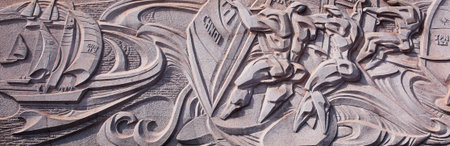 Sports:Stone reliefs - the sea sports - sailing; abstract design in China Rizhao の写真素材