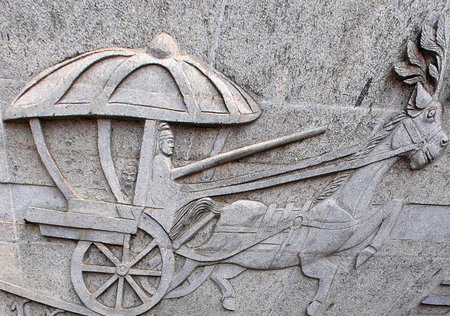 Flat stone sculpture - the oldest running carriage, people, abstract, Confucius, the driverの写真素材