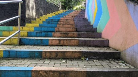 staircase in the park with colorful wall and stairs in the backgroundの写真素材