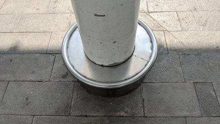 Stainless steel pole in the street, closeup of photoの写真素材