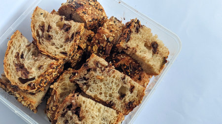 Clear plastic containers are filled with sliced â€‹â€‹Country Bread Sour dough bread....