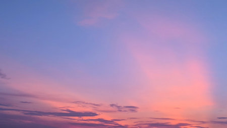 A breathtaking pink and purple sunrise paints the sky. Wispy clouds drift across the canvas,...