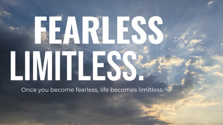 A powerful motivational quote &quot;FEARLESS. LIMITLESS.&quot; is displayed against a dramatic sky background. The sky features dark, moody clouds on the left and bright, sunlit clouds on the right.の写真素材