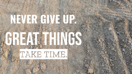 Quote NEVER GIVE UP. GREAT THINGS TAKE TIME, is displayed on a textured, dry ground. The surface is...