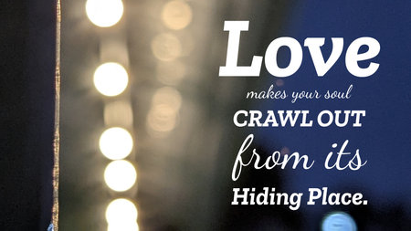 A quote about love is overlaid on a dark, blurry background with a vertical line of glowing, circular lights. . The contrast between the bright lights and the dark background is a key element.の写真素材