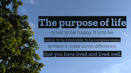 A deep, philosophical quote is displayed against a clear blue sky. . On the left, a green tree is partially visible. Some text is in black blocks with contrasting light blue font.の写真素材