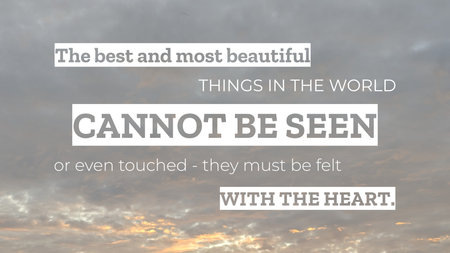A dramatic quote, &#39;The best and most beautiful THINGS IN THE WORLD CANNOT BE SEEN or even touched - they must be felt WITH THE HEART,&#39; is displayed on a blurry, textured, gray and white background.の写真素材