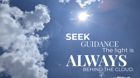 A brilliant sun shines behind white clouds in a blue sky, featuring the motivational quote,...