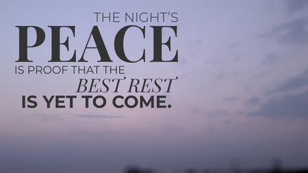 An inspirational quote about peace rest on a soft purple dawn sky background with subtle clouds. "The Night's Peace Is Proof That The Best Rest Is Yet To Come."の写真素材