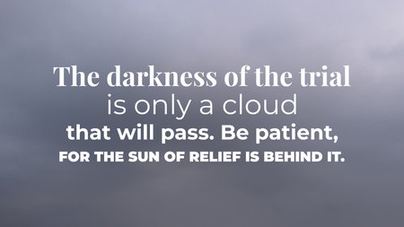 A motivational quote on a dark, moody gray sky background The darkness of the trial is only a cloud that will pass Be patient FOR THE SUN OF RELIEF IS BEHIND IT inspiring hope and enduranceの写真素材