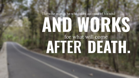 About accountability and preparing for the afterlife displayed over a blurred winding road through a forest The wise man is he who takes account of his soul and works for what will come after deathの写真素材