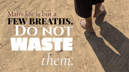 Man&#39;s life is but a few breaths, do not waste them. A person walks barefoot on dry earth, casting a long shadow. This quote emphasizes the value of time, urging wise living and mindfulness.の写真素材