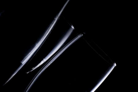 red wine bottle on a dark background の写真素材