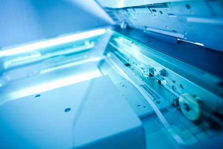 copier with a bright light insideの写真素材