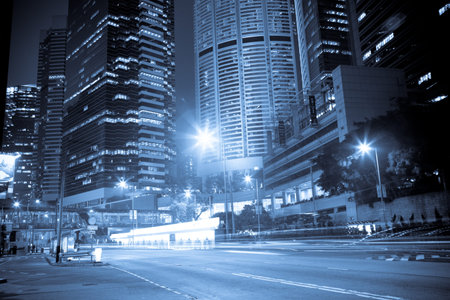 moving car with blur light through city at nightのeditorial素材