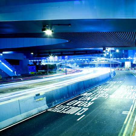 moving car with blur light through city at nightのeditorial素材