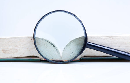 book with a magnifier lensの写真素材