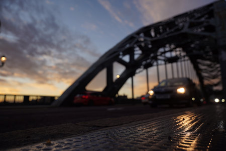 Bokeh of traffic on the Tyne bridge at sunset, abstract backgroundの写真素材