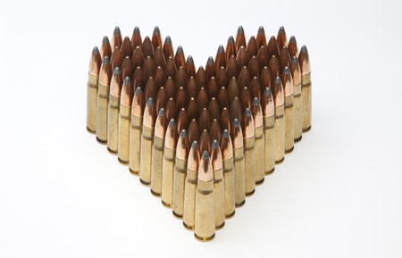 Heart shaped ammo isolated on whiteの写真素材