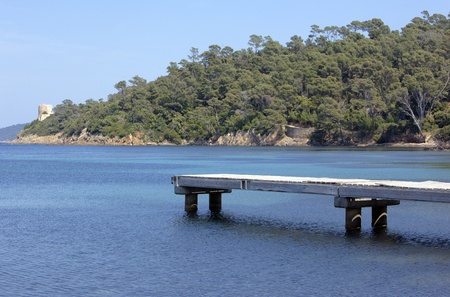 Old wooden pontoon over blue mediterranean sea. Port Cros national park, Franceの写真素材