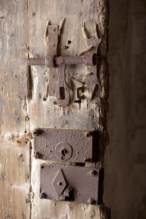 Old rusty wooden door locks and latchesの写真素材