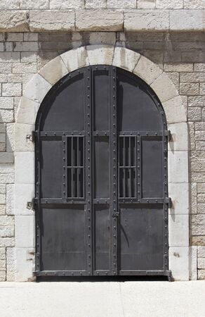 Large strong steel door with a vintage lookの写真素材