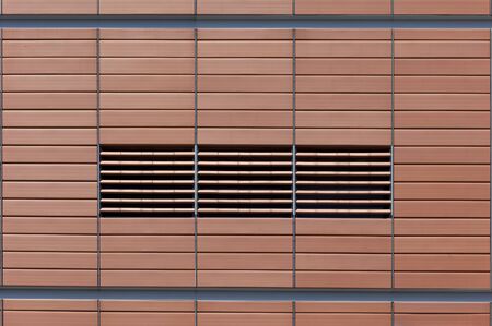 Front view of a symmetrical and evenly ordered wall textureの写真素材