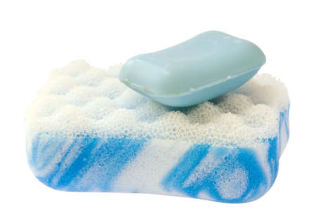 Blue sponge with a piece of soap.の写真素材