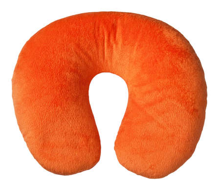 Orange neck pillow, isolated on a white background.の写真素材