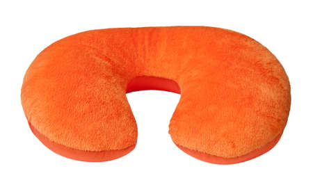Orange neck pillow, isolated on a white background.の写真素材