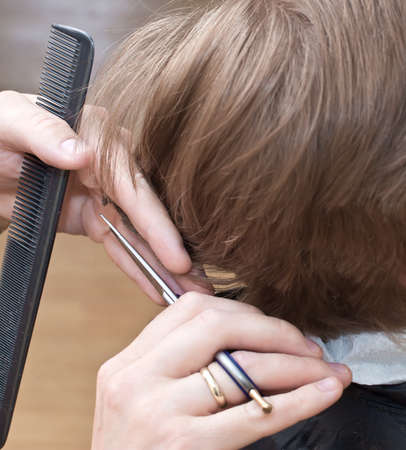 cutting hair at the barberの写真素材